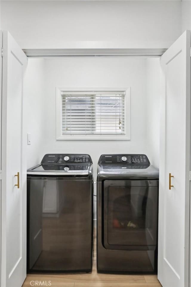 3686 Palo Verde Ave, Long Beach, CA 90808 - washroom with washer and clothes dryer