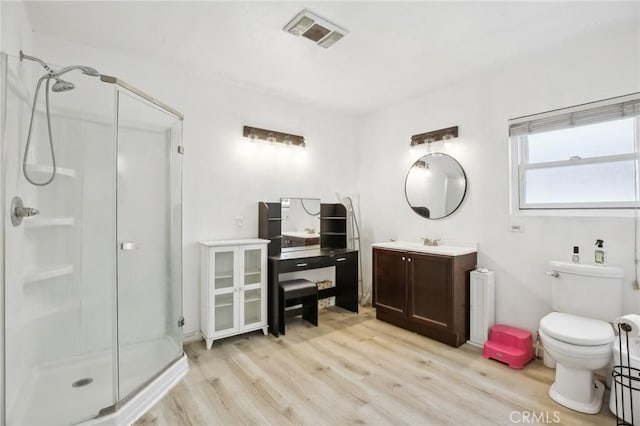 3686 Palo Verde Ave, Long Beach, CA 90808 - full bathroom featuring wood finished floors, a shower stall, toilet, and vanity