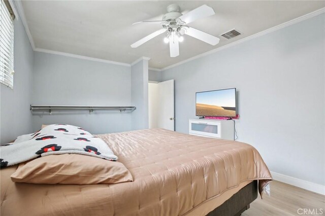 3686 Palo Verde Ave, Long Beach, CA 90808 - bedroom with wood finished floors, baseboards, crown molding, and a ceiling fan