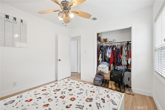 3686 Palo Verde Ave, Long Beach, CA 90808 - bedroom featuring light wood-type flooring, a closet, multiple windows, and baseboards