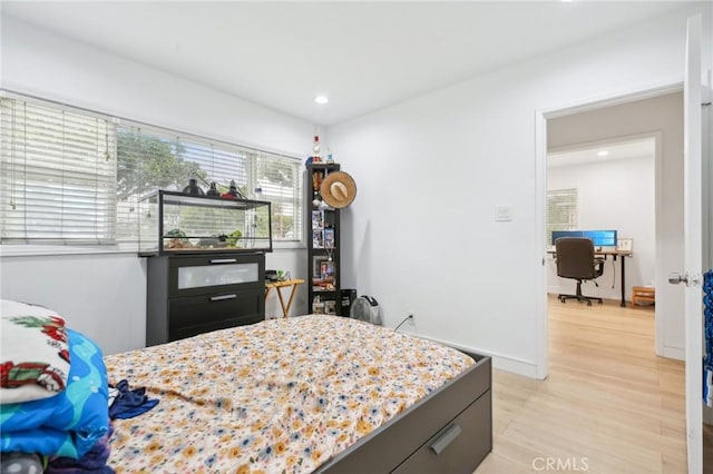 3686 Palo Verde Ave, Long Beach, CA 90808 - bedroom with light wood-style floors, recessed lighting, and an office area