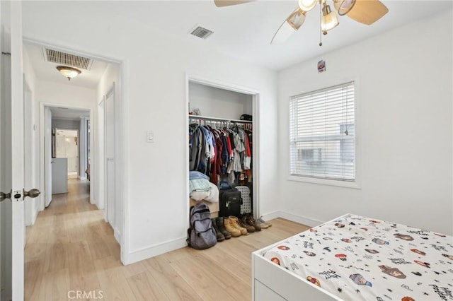 3686 Palo Verde Ave, Long Beach, CA 90808 - bedroom with light wood-style flooring, a closet, baseboards, and ceiling fan