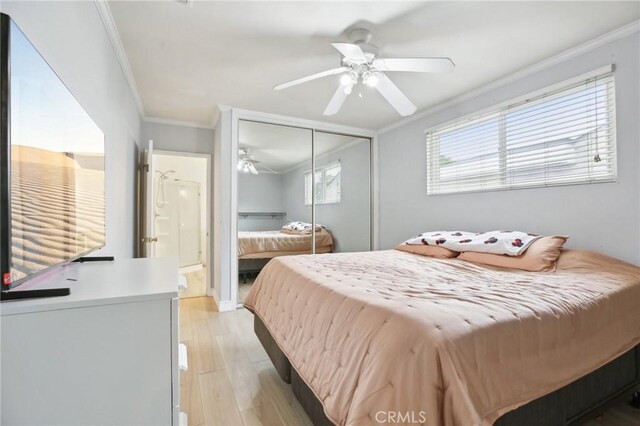3686 Palo Verde Ave, Long Beach, CA 90808 - bedroom with crown molding, a closet, light wood finished floors, and a ceiling fan