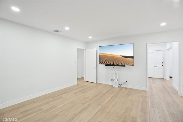 3686 Palo Verde Ave, Long Beach, CA 90808 - unfurnished living room with light wood-style flooring, recessed lighting, and baseboards
