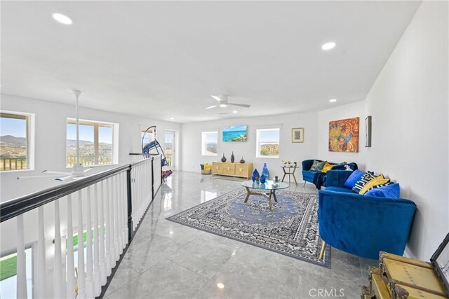 22252 Monte Rancho Dr, Temecula, CA 92590 - living area featuring a ceiling fan, healthy amount of natural light, recessed lighting, and marble finish flooring