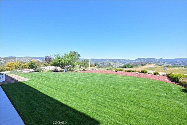 22252 Monte Rancho Dr, Temecula, CA 92590 - view of green lawn with a mountain view