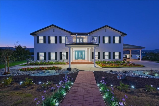 22252 Monte Rancho Dr, Temecula, CA 92590 - view of front facade featuring a balcony and stucco siding