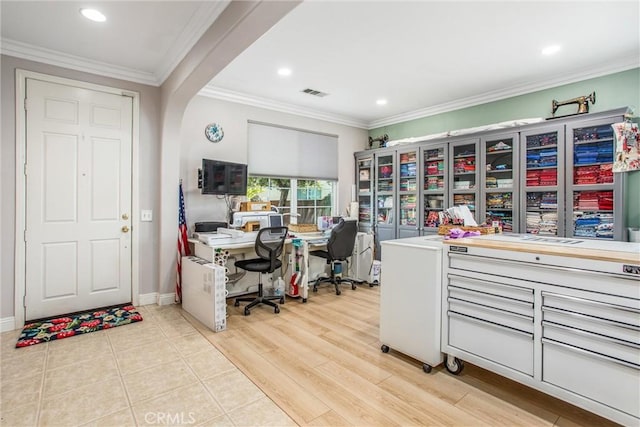 office space with arched walkways, recessed lighting, baseboards, ornamental molding, and wood finished floors