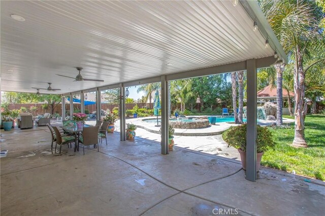 view of patio / terrace featuring ceiling fan, a fenced backyard, a gazebo, outdoor dining space, and a pool with connected hot tub