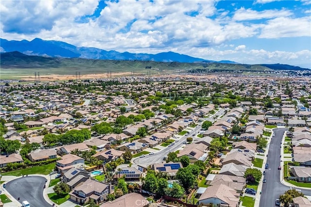 aerial perspective of suburban area with mountains