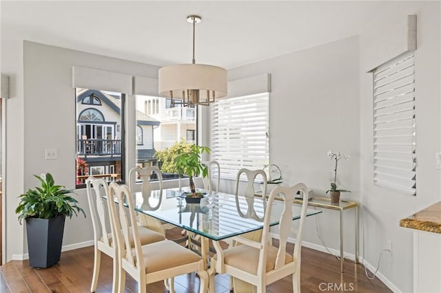 444 30th St, Manhattan Beach, CA 90266 - dining area featuring wood finished floors, baseboards, and a chandelier