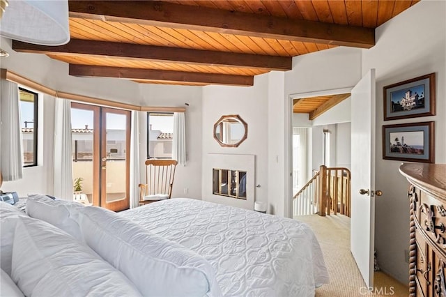 444 30th St, Manhattan Beach, CA 90266 - bedroom featuring wood ceiling, access to exterior, beamed ceiling, and carpet flooring