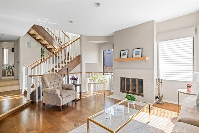 444 30th St, Manhattan Beach, CA 90266 - living area with hardwood / wood-style floors, baseboards, stairway, and a fireplace