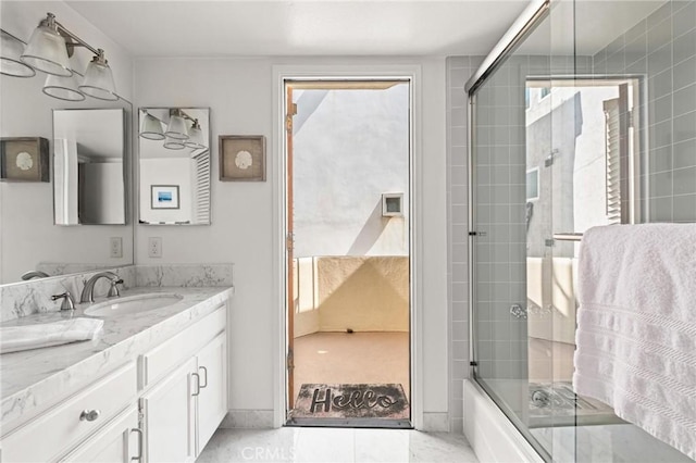 444 30th St, Manhattan Beach, CA 90266 - bathroom featuring vanity and bath / shower combo with glass door