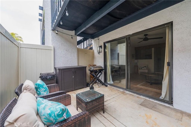 view of patio / terrace featuring fence, an outdoor hangout area, and area for grilling