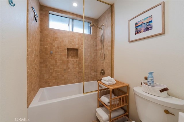 bathroom featuring toilet and shower / bathtub combination