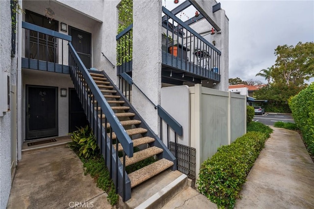 215 Wichita Ave Unit 106, Huntington Beach, CA 92648 - view of exterior entry featuring stucco siding