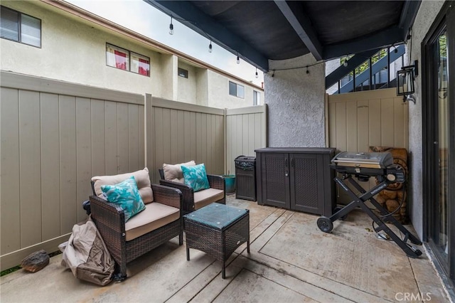 215 Wichita Ave Unit 106, Huntington Beach, CA 92648 - view of patio / terrace with a wooden deck and an outdoor living space