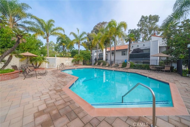 215 Wichita Ave Unit 106, Huntington Beach, CA 92648 - community pool featuring a patio