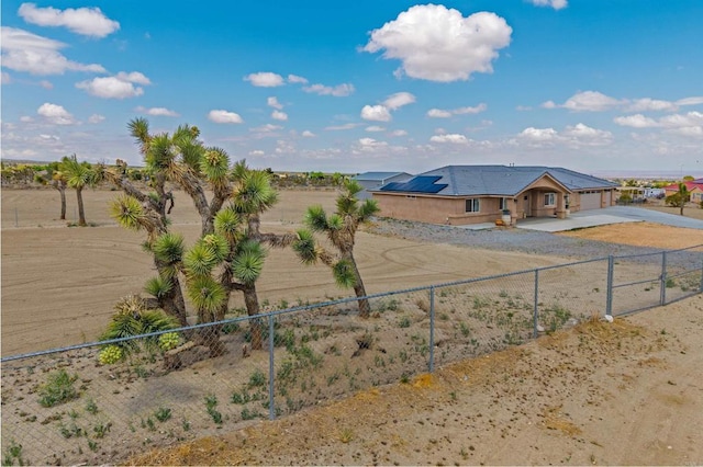 11374 Desert View Rd, Pinon Hills, CA 92372 - fenced yard featuring concrete driveway and a garage