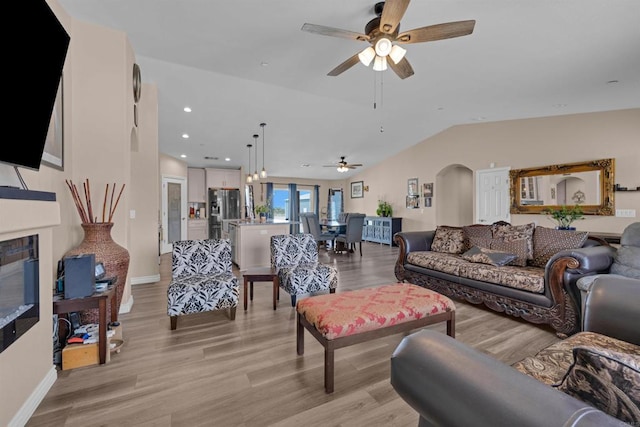 11374 Desert View Rd, Pinon Hills, CA 92372 - living area featuring ceiling fan, light wood-type flooring, baseboards, lofted ceiling, and recessed lighting