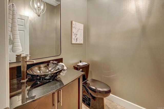 3522 Lancewood Way, Fallbrook, CA 92028 - bathroom with baseboards, vanity, toilet, tile patterned flooring, and a chandelier