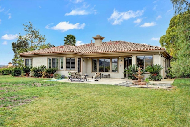 3522 Lancewood Way, Fallbrook, CA 92028 - back of property with a patio area, stucco siding, and a lawn