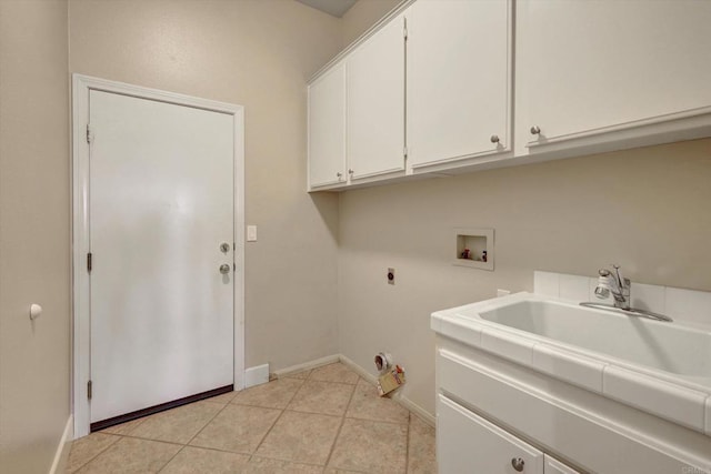 3522 Lancewood Way, Fallbrook, CA 92028 - washroom featuring cabinet space, washer hookup, hookup for an electric dryer, baseboards, and light tile patterned floors