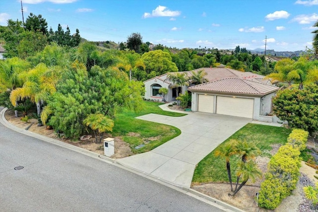 3522 Lancewood Way, Fallbrook, CA 92028 - view of front of property with a garage, driveway, a front yard, a tile roof, and stucco siding