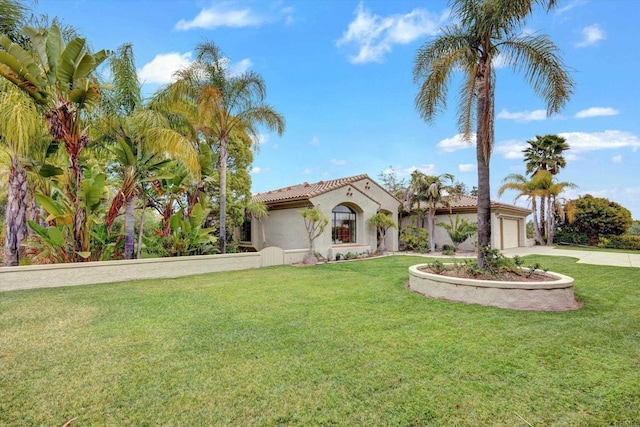 3522 Lancewood Way, Fallbrook, CA 92028 - mediterranean / spanish house featuring stucco siding, a garage, concrete driveway, a tile roof, and a front lawn