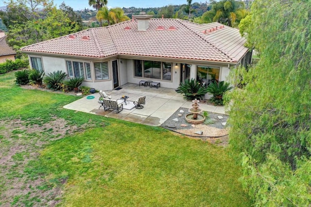 3522 Lancewood Way, Fallbrook, CA 92028 - back of property featuring a yard, a tiled roof, a patio area, and stucco siding