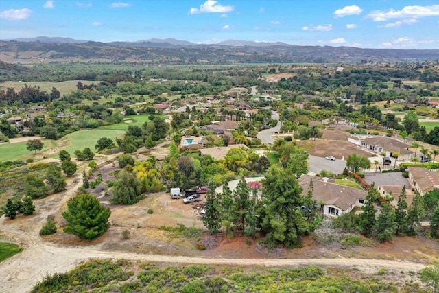 3522 Lancewood Way, Fallbrook, CA 92028 - aerial view of property's location with a mountainous background and nearby suburban area