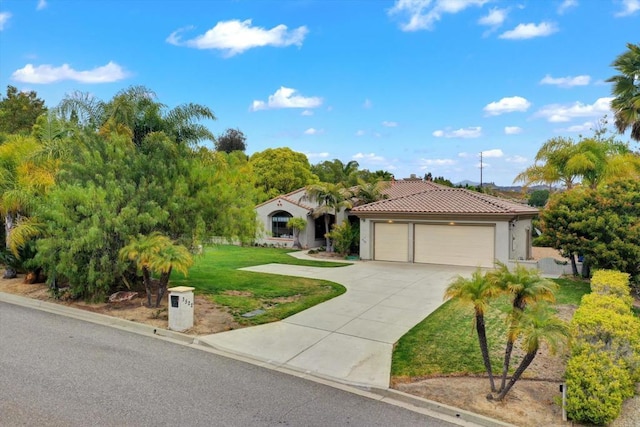 3522 Lancewood Way, Fallbrook, CA 92028 - mediterranean / spanish-style house with an attached garage, driveway, stucco siding, a front yard, and a tiled roof