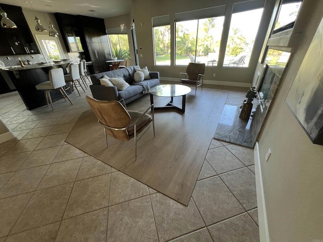 3522 Lancewood Way, Fallbrook, CA 92028 - living area featuring light tile patterned floors and baseboards