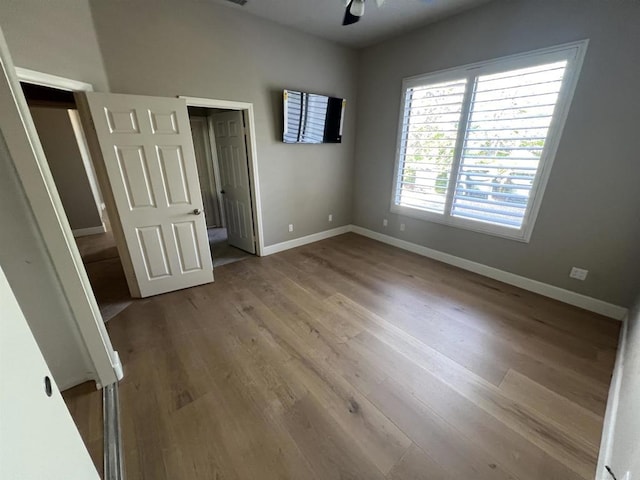 3522 Lancewood Way, Fallbrook, CA 92028 - unfurnished bedroom with wood finished floors and baseboards