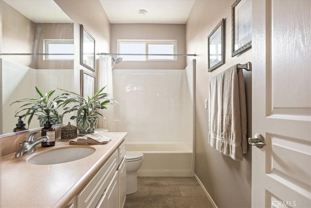 full bathroom with toilet, vanity, shower / bath combination, and baseboards