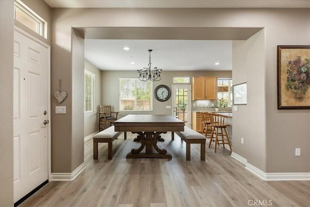 1682 Beaver Unit B, Beaumont, CA 92223 - dining room featuring baseboards, light wood-style floors, recessed lighting, and a chandelier