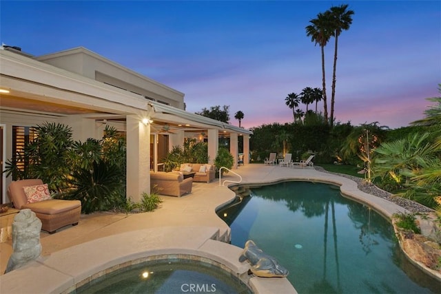 swimming pool featuring a patio area, a ceiling fan, an outdoor living space, and an in-ground hot tub