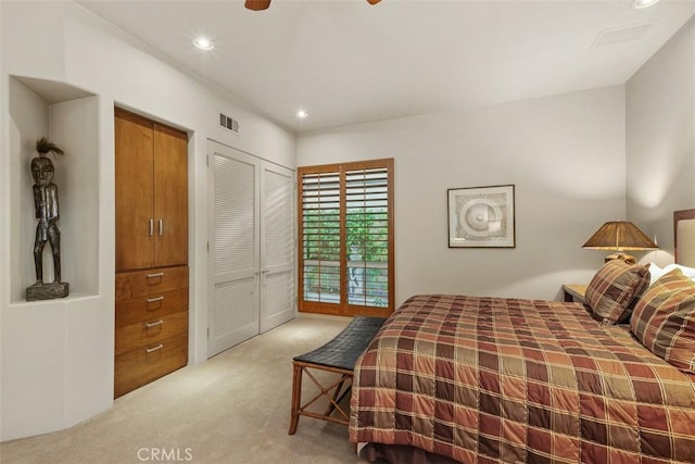 bedroom with light carpet, recessed lighting, and ceiling fan