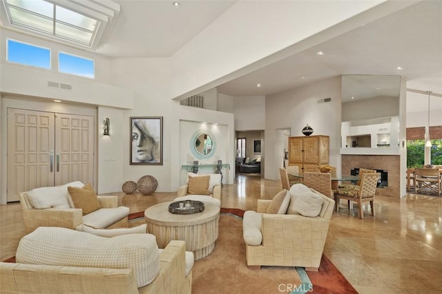 lobby with a high ceiling and recessed lighting