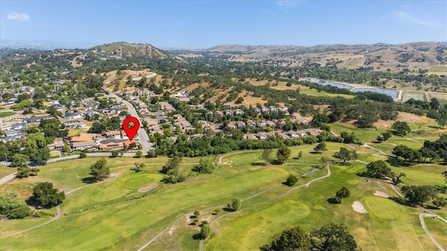 8670 Erika Ct, Atascadero, CA 93422 - aerial overview of property's location featuring a mountain backdrop, a golf club, and nearby suburban area