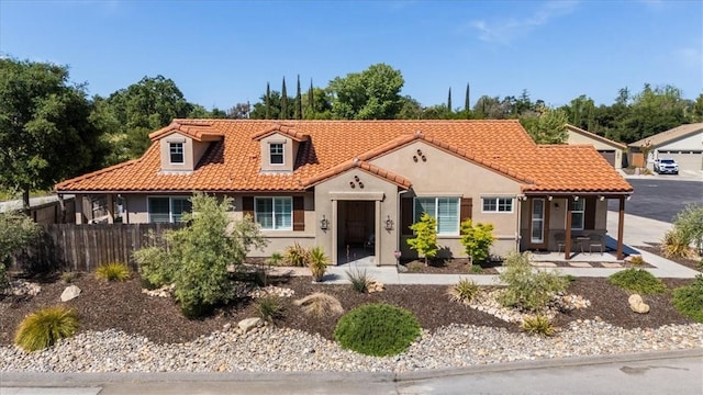 8670 Erika Ct, Atascadero, CA 93422 - view of front facade with fence, stucco siding, and a tile roof