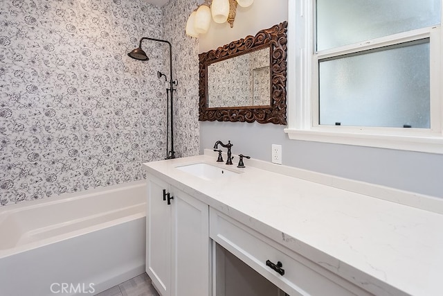 full bathroom featuring tub / shower combination and vanity