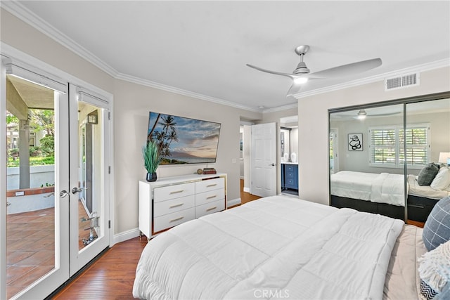 bedroom with french doors, ornamental molding, dark wood-style floors, access to exterior, and baseboards