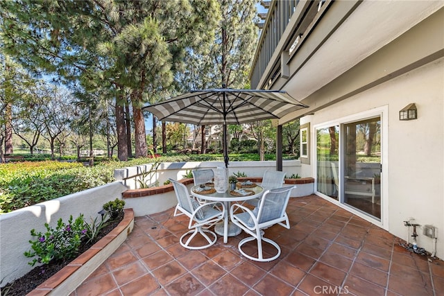 view of patio with outdoor dining area
