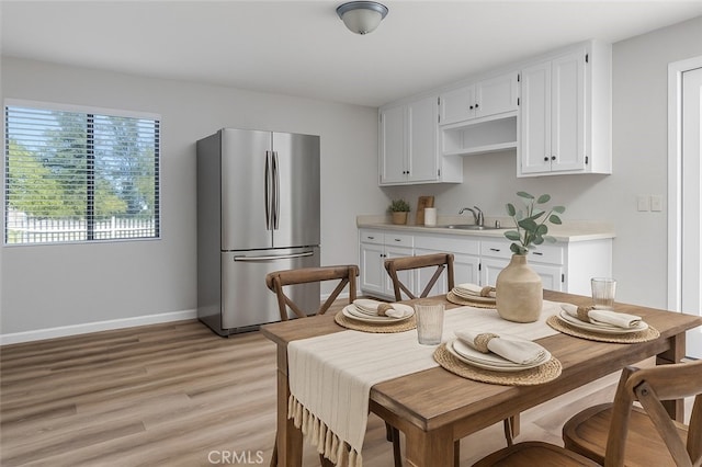 9019 San Gabriel Rd, Atascadero, CA 93422 - dining space featuring light wood-style flooring and baseboards
