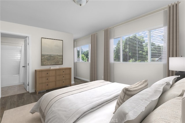 9019 San Gabriel Rd, Atascadero, CA 93422 - bedroom with wood finished floors, baseboards, and connected bathroom