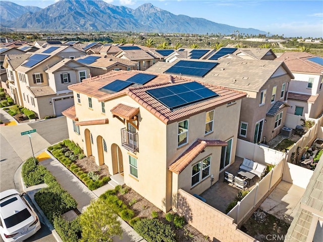 aerial perspective of suburban area featuring a mountain backdrop
