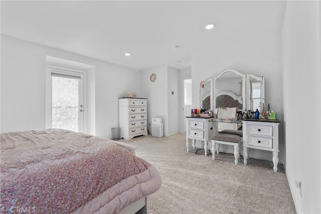 bedroom featuring light colored carpet and recessed lighting