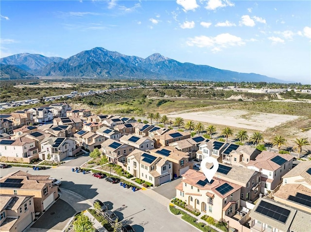 aerial view of residential area with mountains
